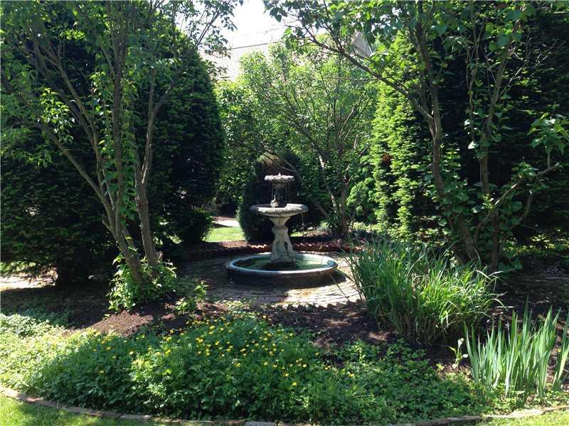1103 13th Street McKees Rocks, PA 15136 - Photo 23 of 25 Yard/Garden. This working fountain is in the center of the 1/4 acre of private property. It is surrounded by mature trees and shrubs, and a wide variety of foliage.