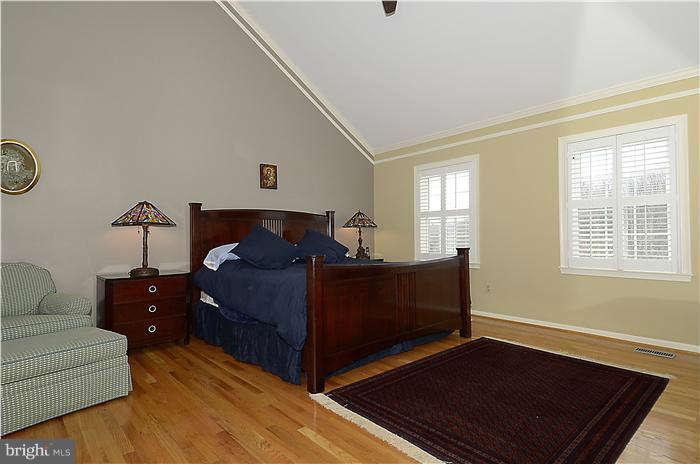 8003 Rising Ridge Road Bethesda, MD 20817 - Photo 8 of 19 a living room with furniture and wooden floor