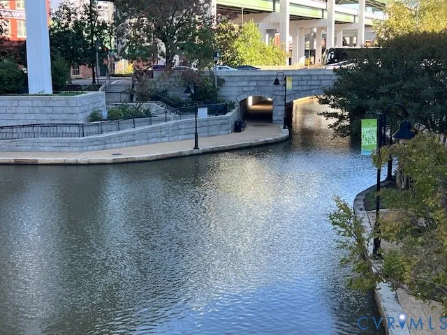 a view of a patio with table and chairs and potted plants