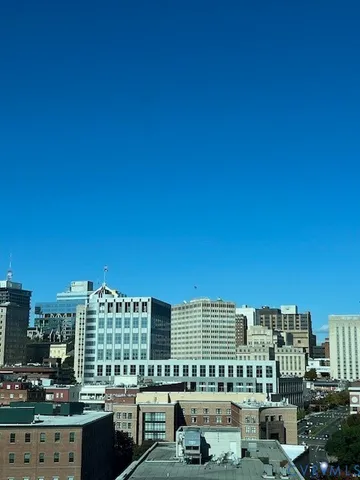 a view of a city with tall buildings