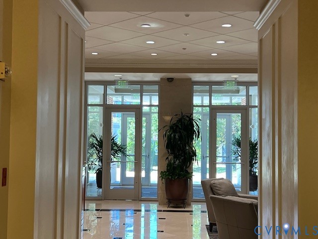 301 Virginia Street, Unit 1102 Richmond, VA 23219 - Photo 19 of 28 a room with furniture and a potted plant