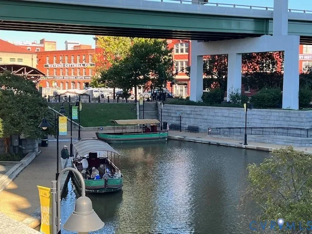 a view of a lake with a house and outdoor space