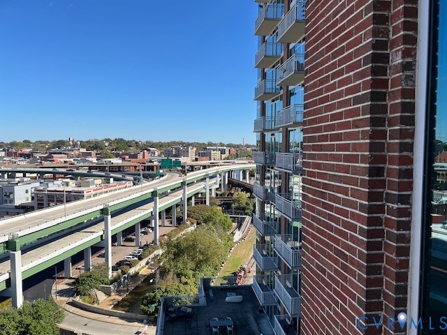 301 Virginia Street, Unit 1102 Richmond, VA 23219 - Photo 23 of 28 a balcony with city view