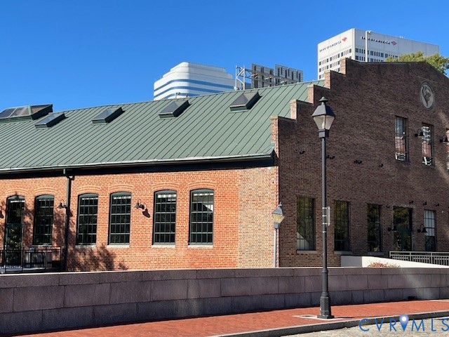 301 Virginia Street, Unit 1102 Richmond, VA 23219 - Photo 24 of 28 a front view of building with street