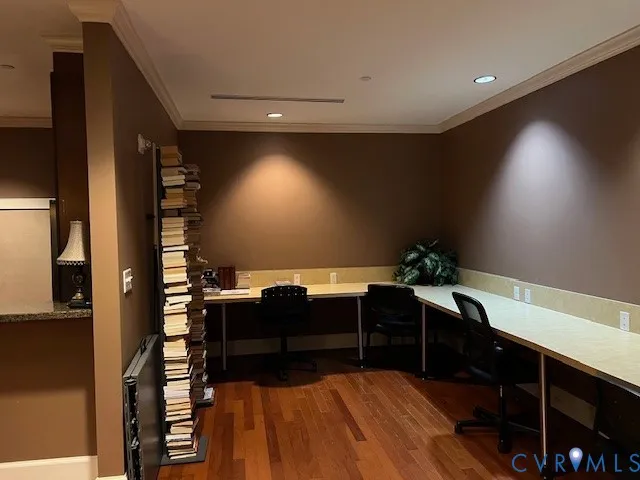 a view of workspace with wooden floor