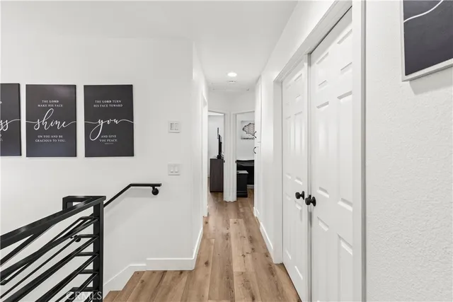 a bathroom with a double vanity sink mirror and shower