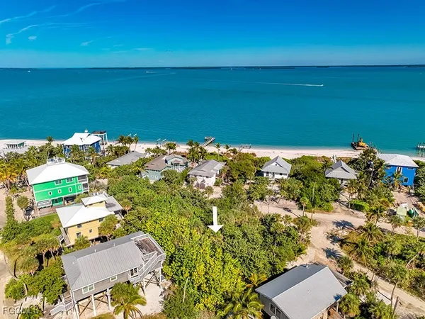 a view of a lake with a building in the background