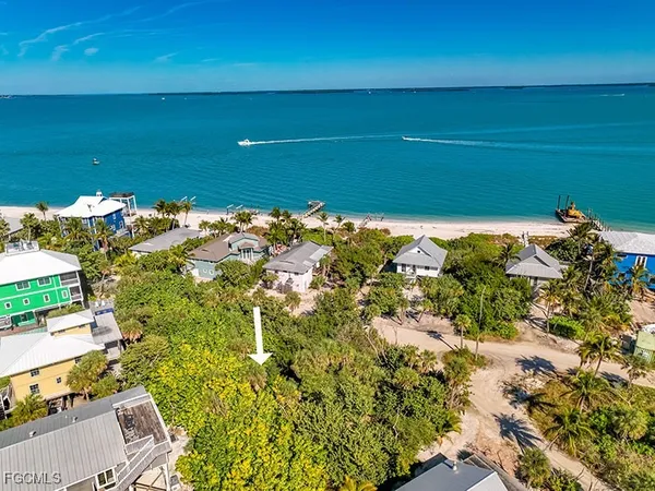 a view of a lake with a yard