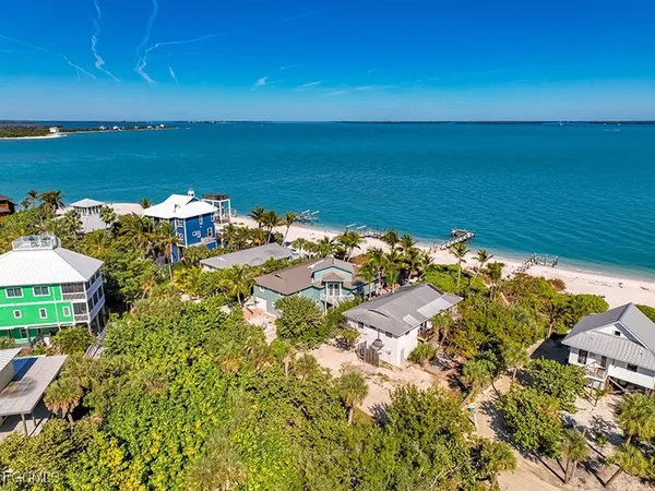 a view of a lake with a building in the background