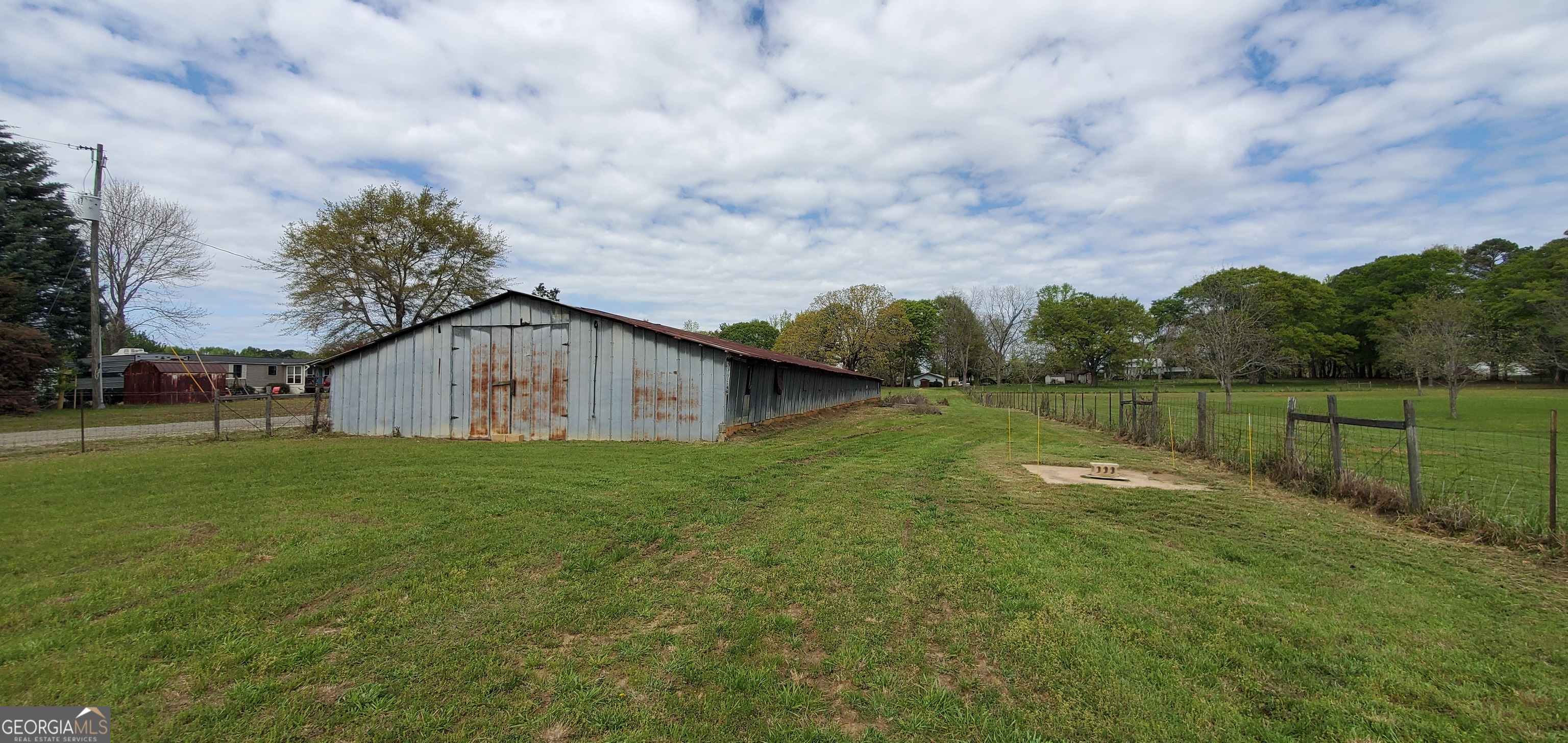 1135 Burger Road Watkinsville, GA 30677 - Photo 5 of 20 a backyard of a house with lots of green space