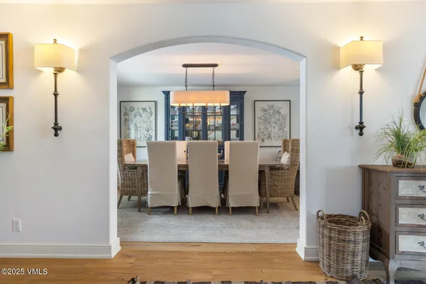 a view of living room filled with furniture and wooden floor