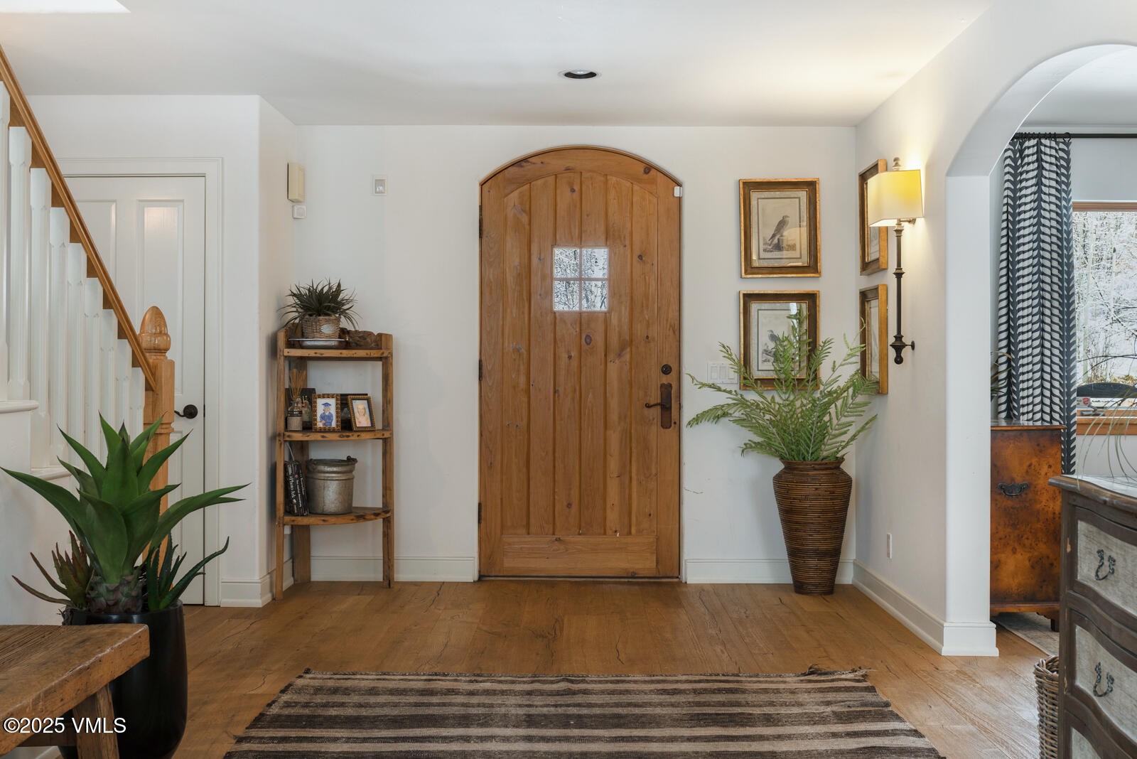 55 Elk Place Edwards, CO 81632 - Photo 20 of 68 a view of entryway with livingroom and wooden floor