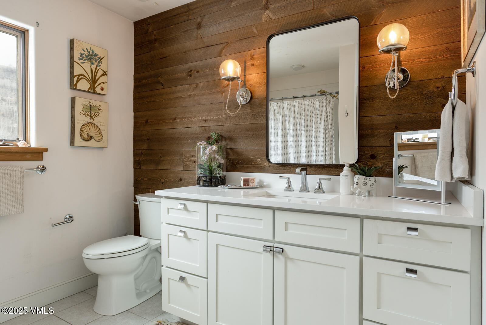 55 Elk Place Edwards, CO 81632 - Photo 30 of 68 a bathroom with a toilet sink and mirror