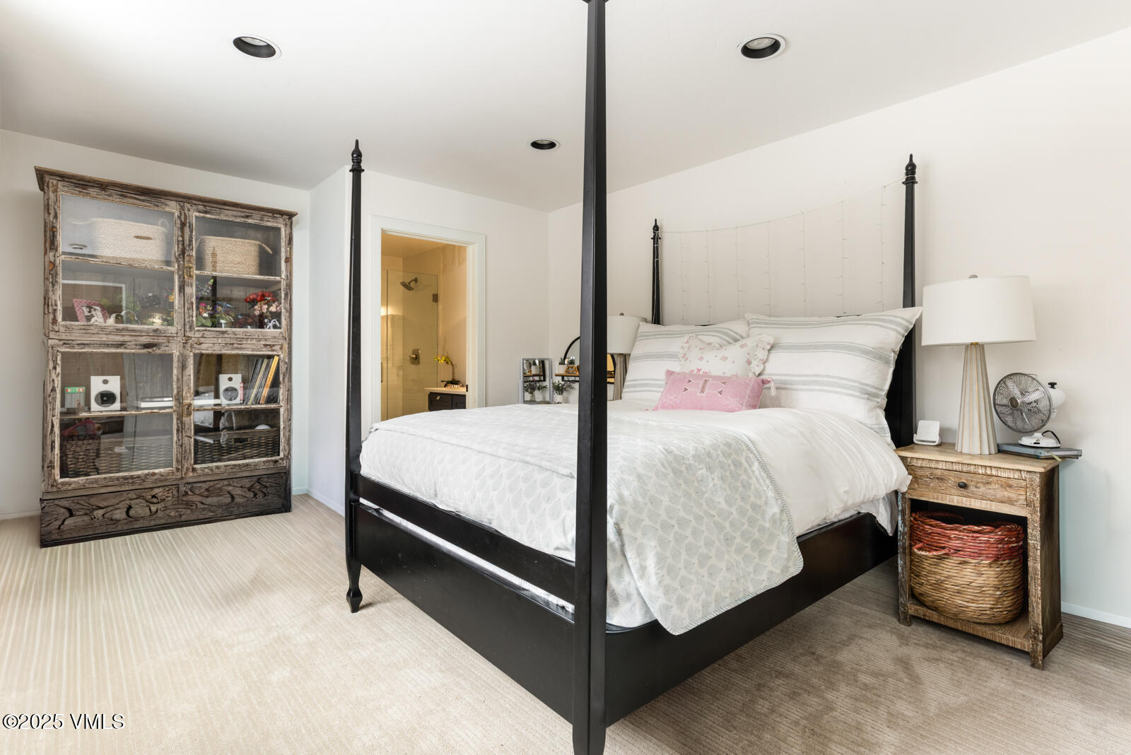 55 Elk Place Edwards, CO 81632 - Photo 31 of 68 a bedroom with a bed and a night stand