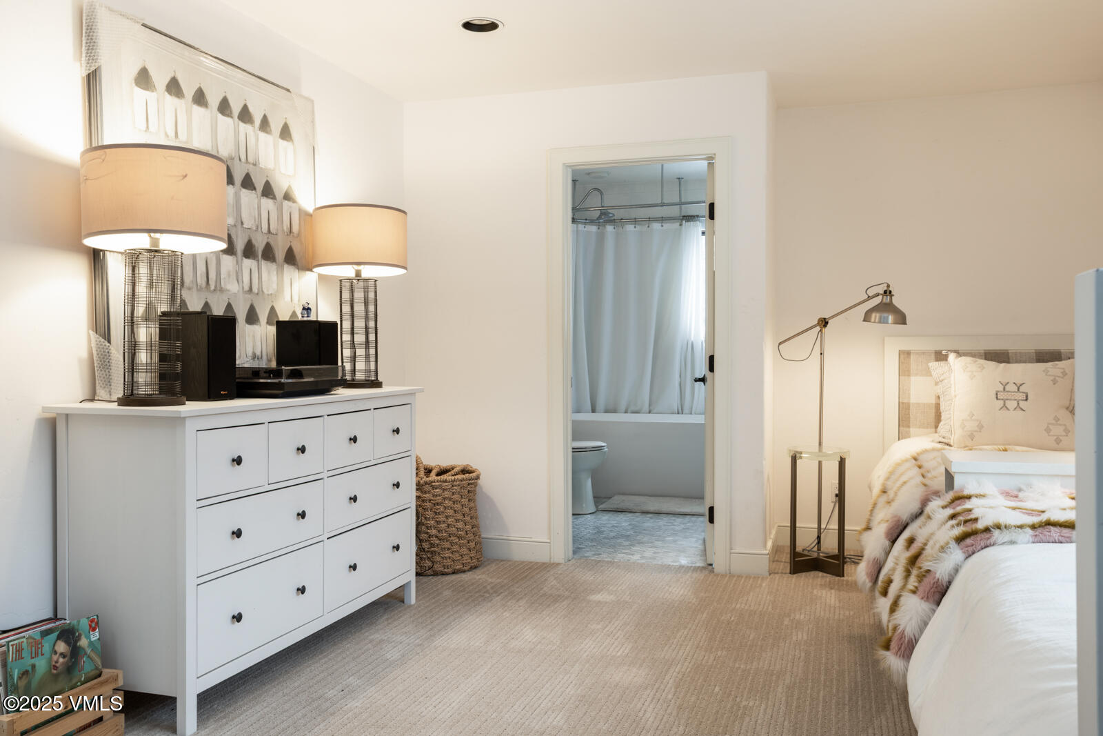 55 Elk Place Edwards, CO 81632 - Photo 35 of 68 a view of a bedroom with a bed and flat screen tv