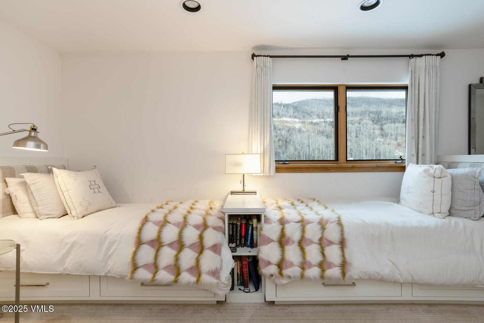 55 Elk Place Edwards, CO 81632 - Photo 36 of 68 a bedroom with a large bed and a window