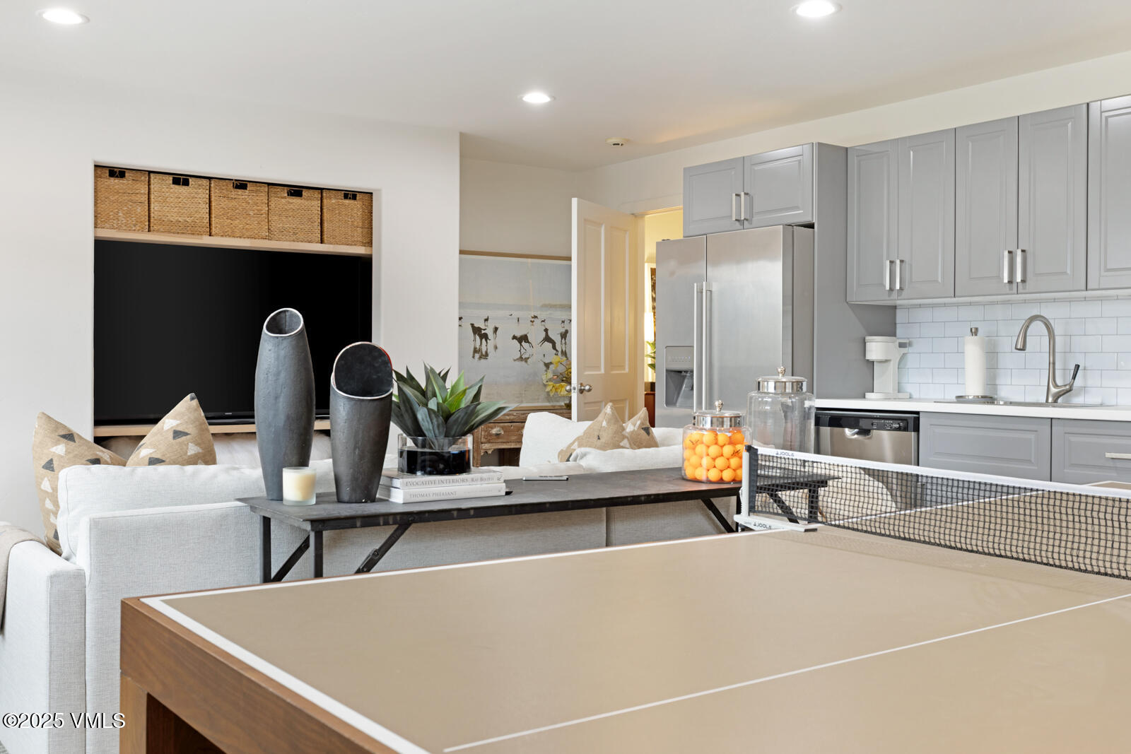 55 Elk Place Edwards, CO 81632 - Photo 45 of 68 a living room with furniture and a fireplace