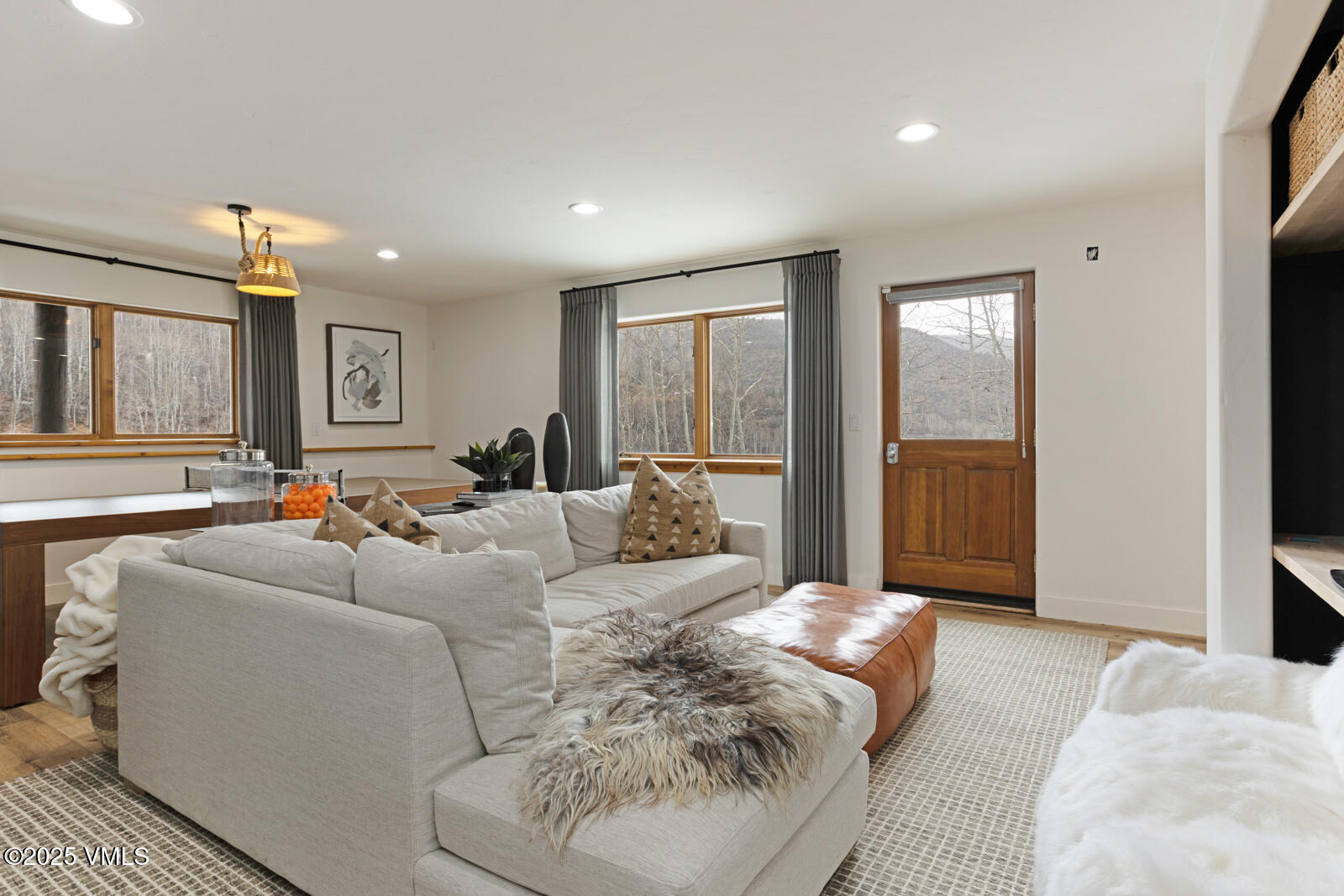 55 Elk Place Edwards, CO 81632 - Photo 50 of 68 a living room with furniture and a large window