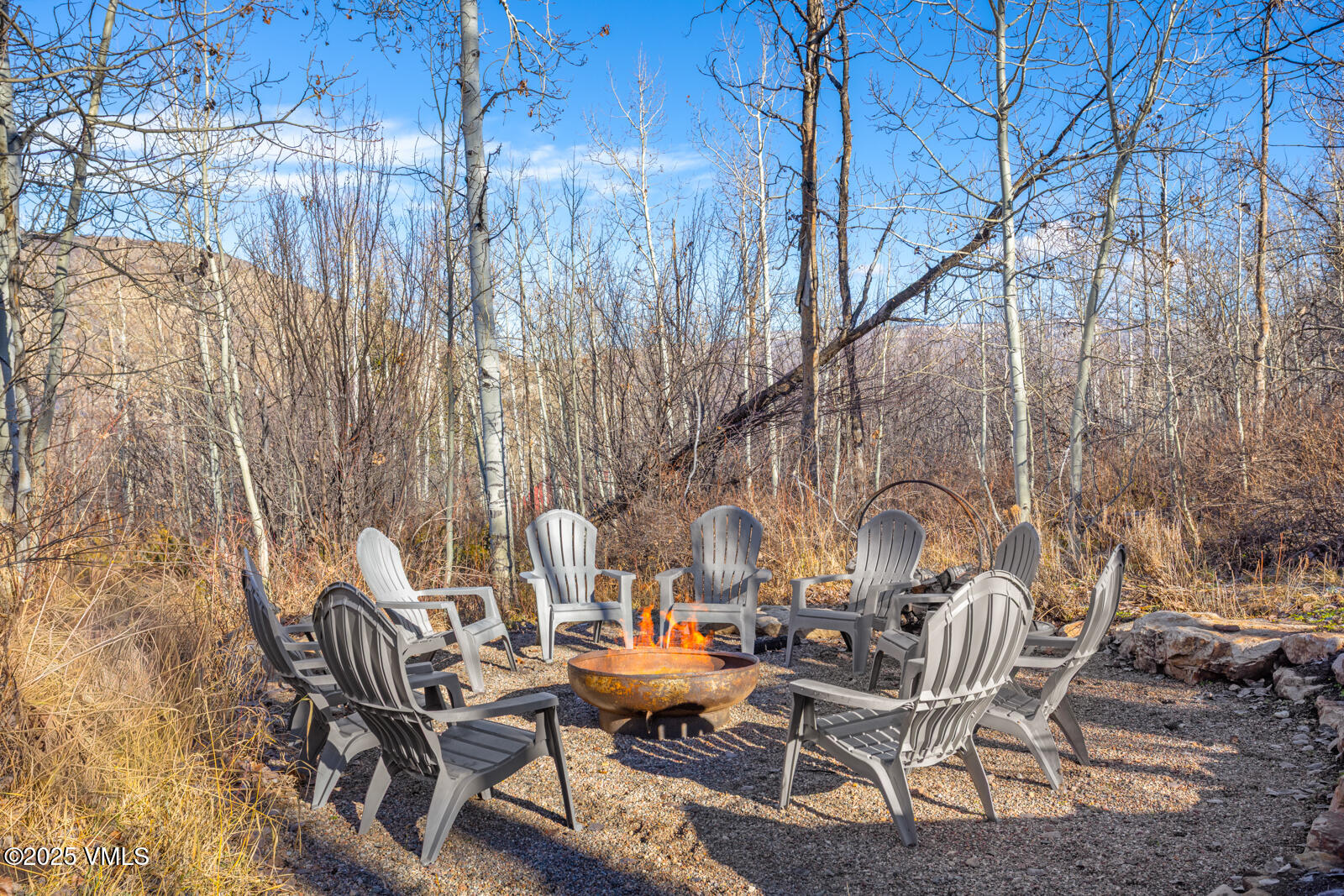 55 Elk Place Edwards, CO 81632 - Photo 52 of 68 a view of a chairs and table in backyard