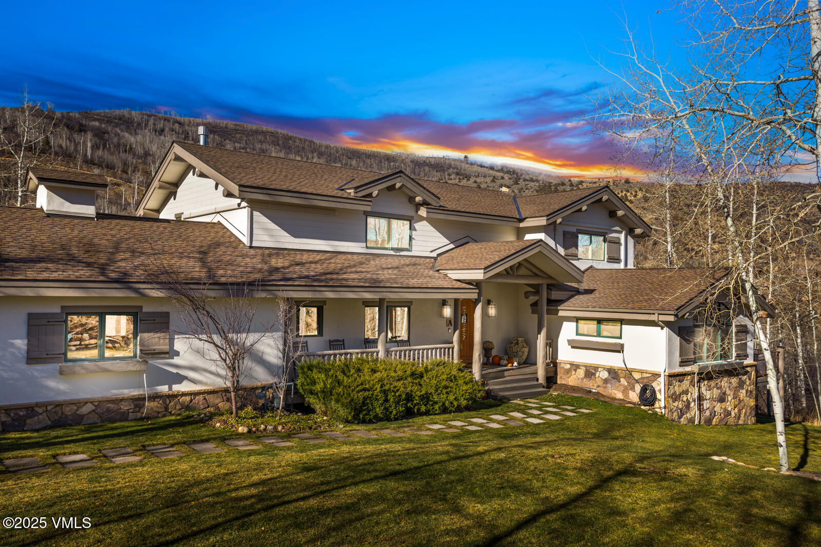 55 Elk Place Edwards, CO 81632 - Photo 63 of 68 a view of a big house with a big yard and large tree
