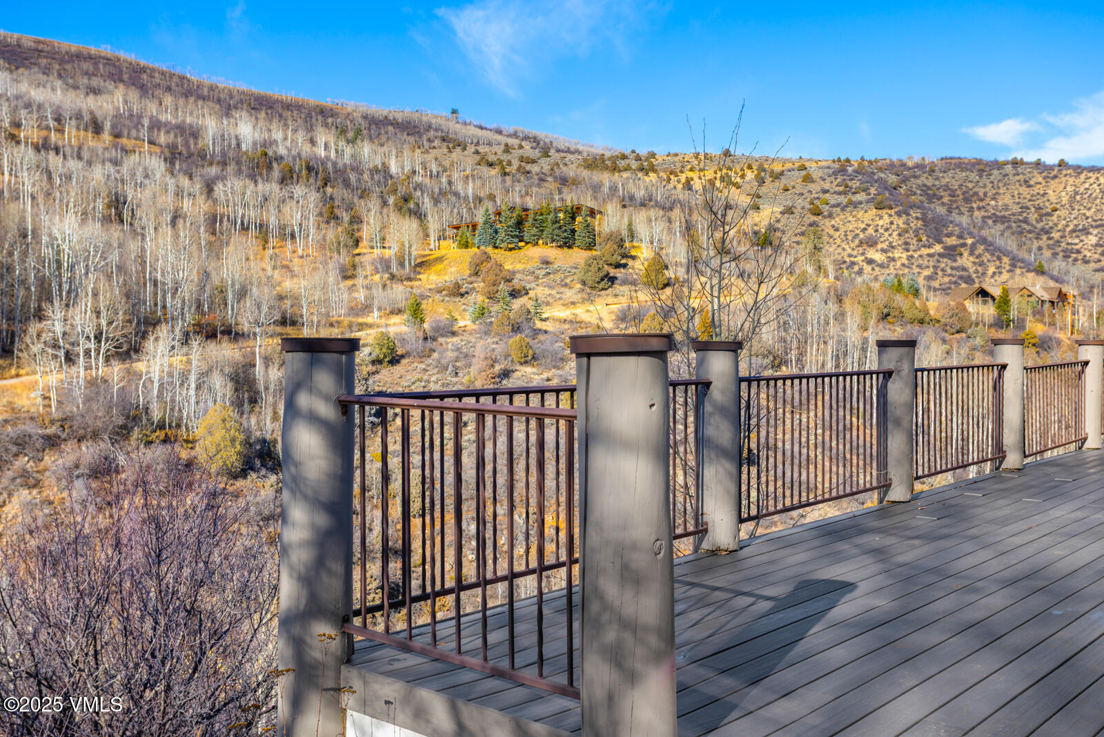 55 Elk Place Edwards, CO 81632 - Photo 66 of 68 a view of a balcony with wooden floor and city view
