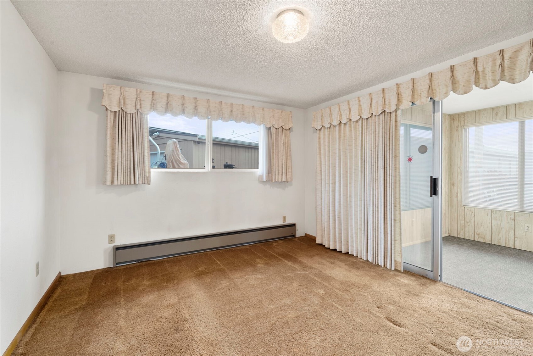 9101 Steilacoom Road Southeast, Unit 93 Olympia, WA 98513 - Photo 15 of 40 a view of an empty room with a window