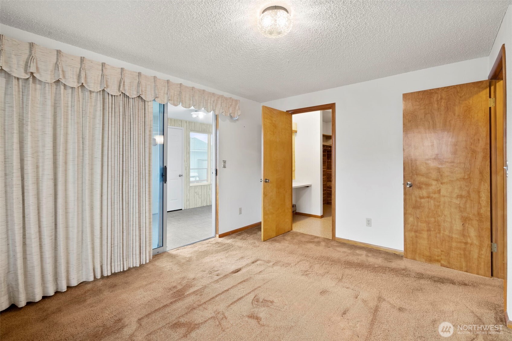 9101 Steilacoom Road Southeast, Unit 93 Olympia, WA 98513 - Photo 16 of 40 a view of a bathroom with a tub shower and sink
