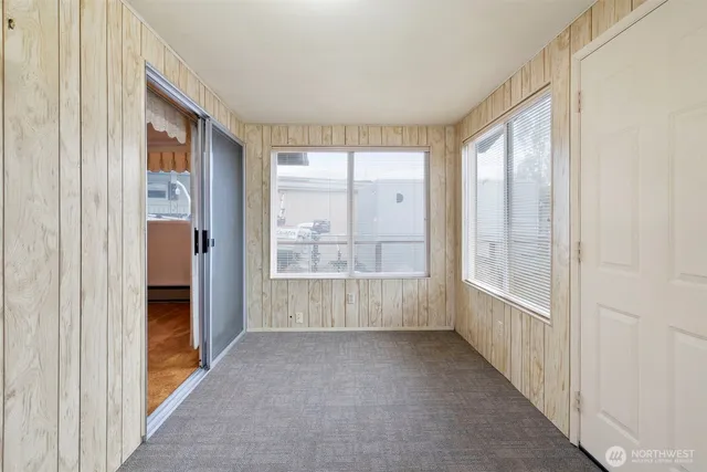 a view of a bathroom from a hallway