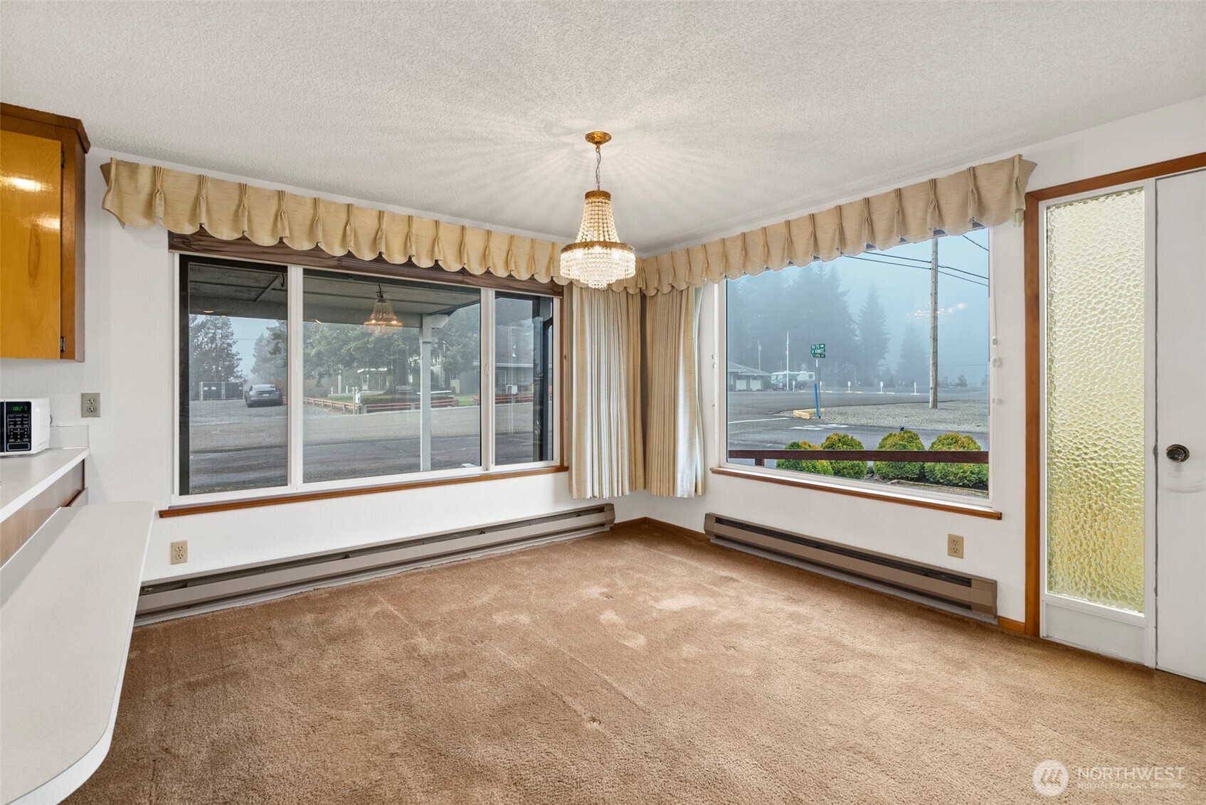 9101 Steilacoom Road Southeast, Unit 93 Olympia, WA 98513 - Photo 8 of 40 a view of an empty room with a window