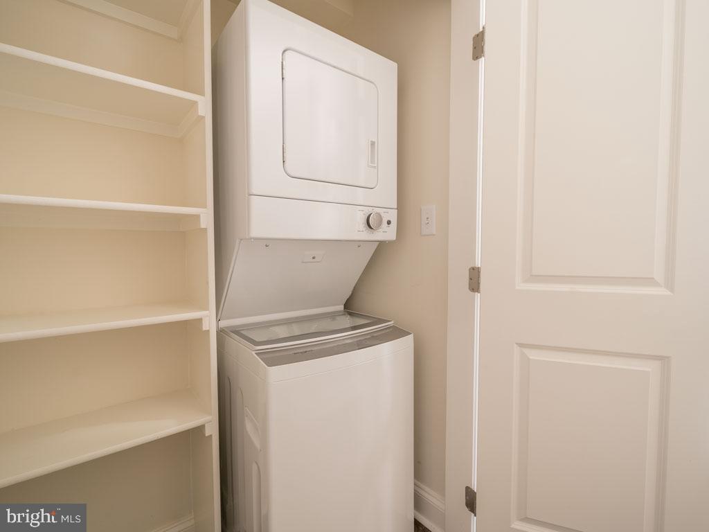 22595 Windsor Locks Square Ashburn, VA 20148 - Photo 43 of 56 a utility room with dryer and washer