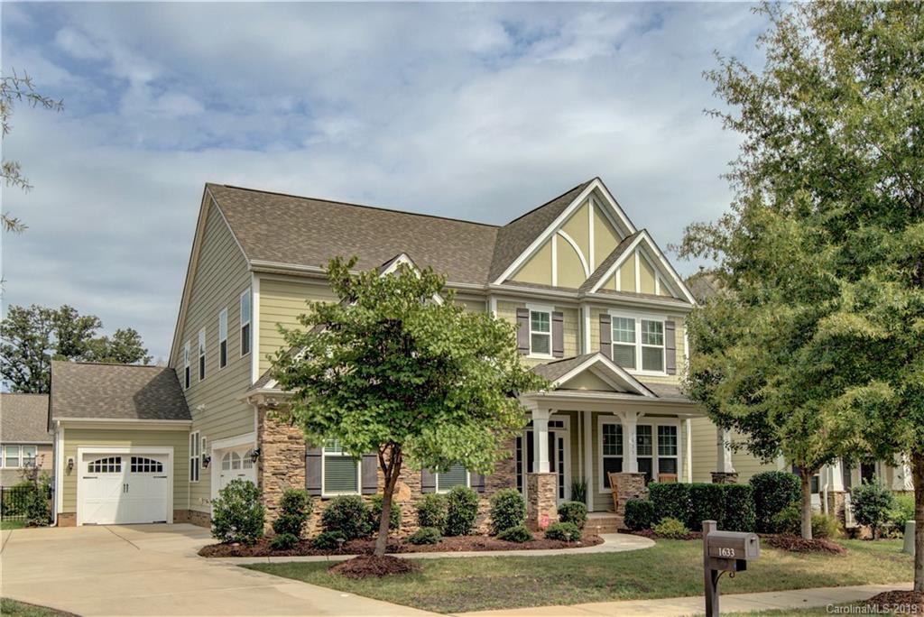 1633 Ridgehaven Road Waxhaw, NC 28173 - Photo 1 of 48 a front view of a residential houses with yard
