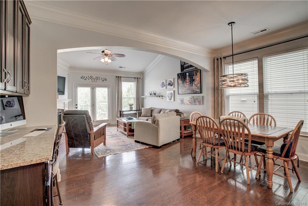 1633 Ridgehaven Road Waxhaw, NC 28173 - Photo 12 of 48 a living room with furniture and wooden floor