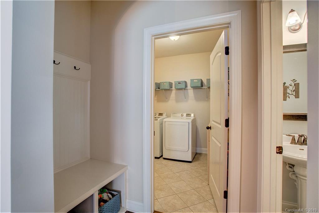 1633 Ridgehaven Road Waxhaw, NC 28173 - Photo 19 of 48 a bathroom with a sink and a mirror