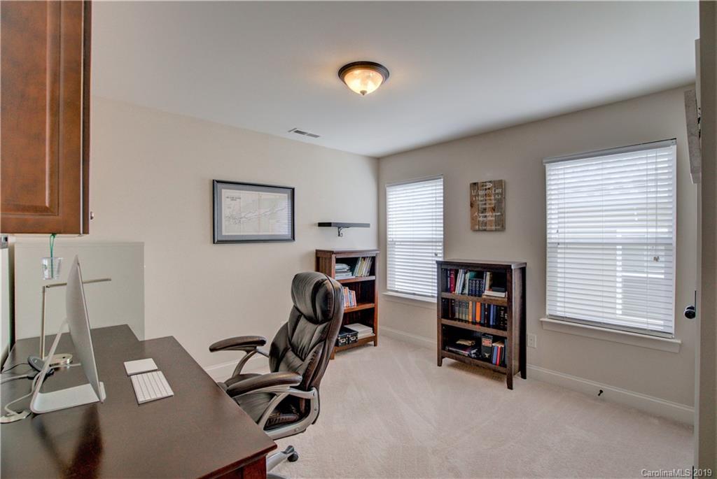 1633 Ridgehaven Road Waxhaw, NC 28173 - Photo 28 of 48 a view of a workspace with furniture and a window
