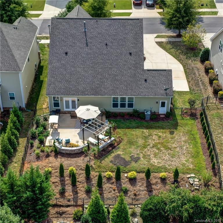 1633 Ridgehaven Road Waxhaw, NC 28173 - Photo 38 of 48 a aerial view of a house with swimming pool and a yard