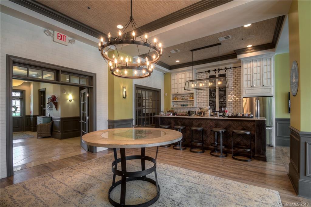 1633 Ridgehaven Road Waxhaw, NC 28173 - Photo 43 of 48 a room with dining table and chairs
