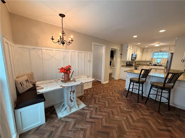 a view of a dining room with furniture