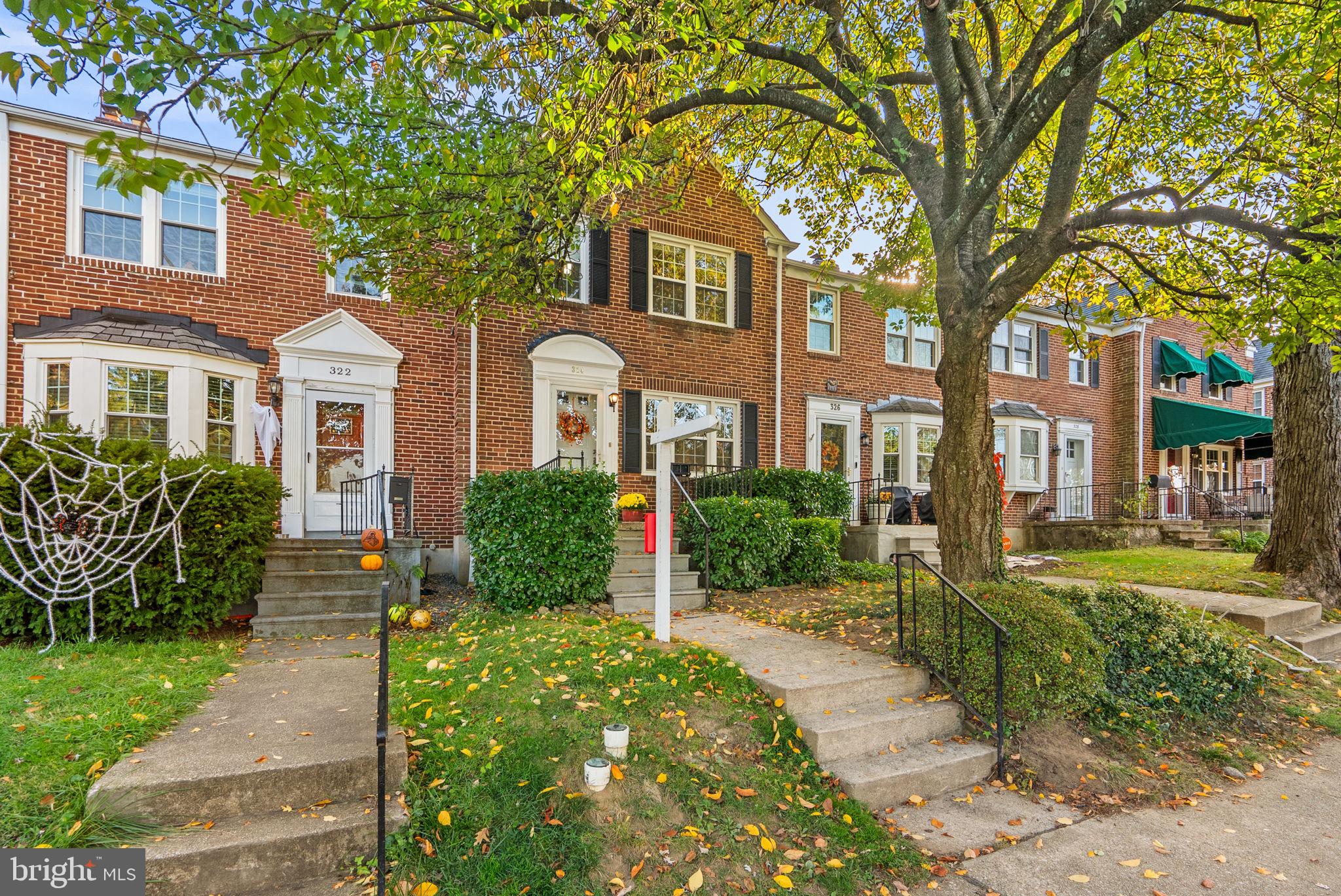 324 Stanmore Road Baltimore, MD 21212 - Photo 2 of 40 a front view of a house with a yard