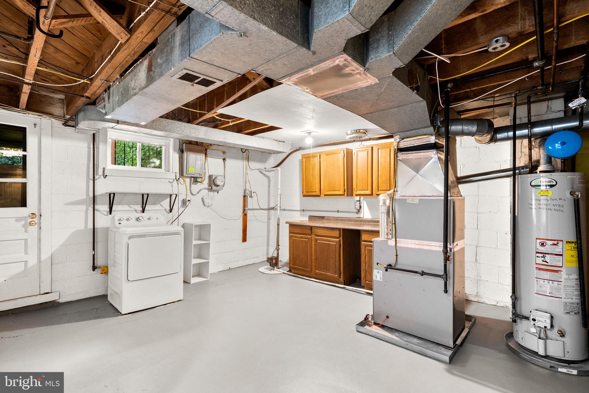 324 Stanmore Road Baltimore, MD 21212 - Photo 27 of 40 a utility room with dryer and washer