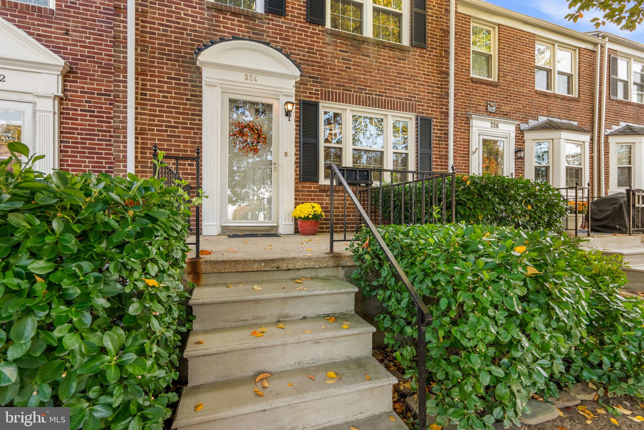 324 Stanmore Road Baltimore, MD 21212 - Photo 3 of 40 a front view of a house with a garden