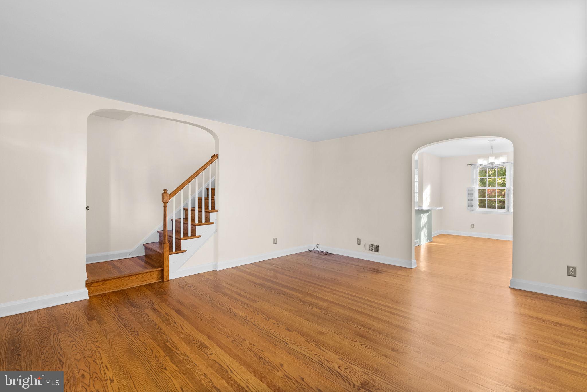 324 Stanmore Road Baltimore, MD 21212 - Photo 5 of 40 a view of empty room with wooden floor