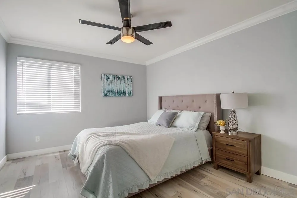 515 Bluffview Road Spring Valley, CA 91977 - Photo 24 of 41 a bedroom with bed and window