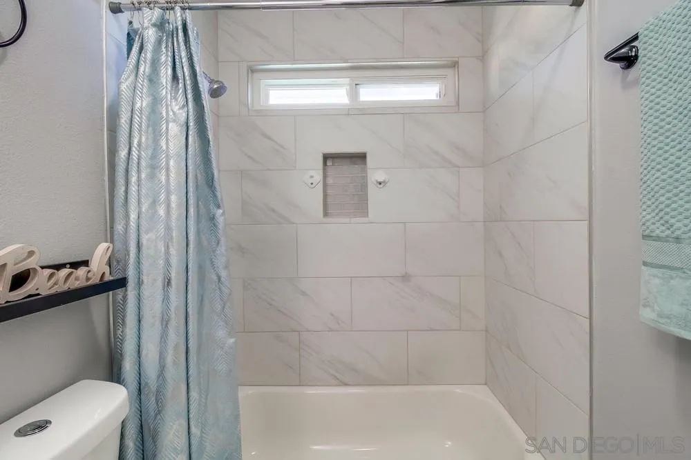 515 Bluffview Road Spring Valley, CA 91977 - Photo 29 of 41 a bathroom with a toilet and a shower