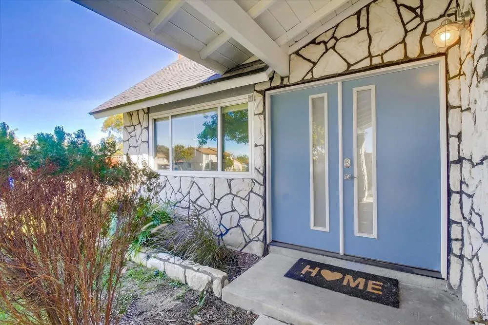 515 Bluffview Road Spring Valley, CA 91977 - Photo 3 of 41 a front view of a house with garden
