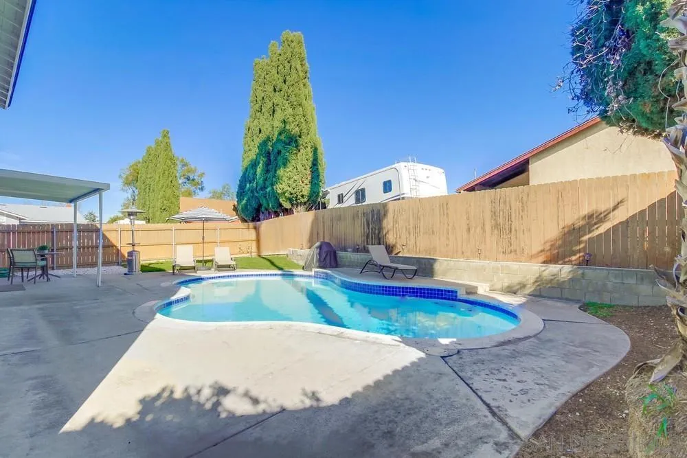 515 Bluffview Road Spring Valley, CA 91977 - Photo 37 of 41 a view of a swimming pool with a patio