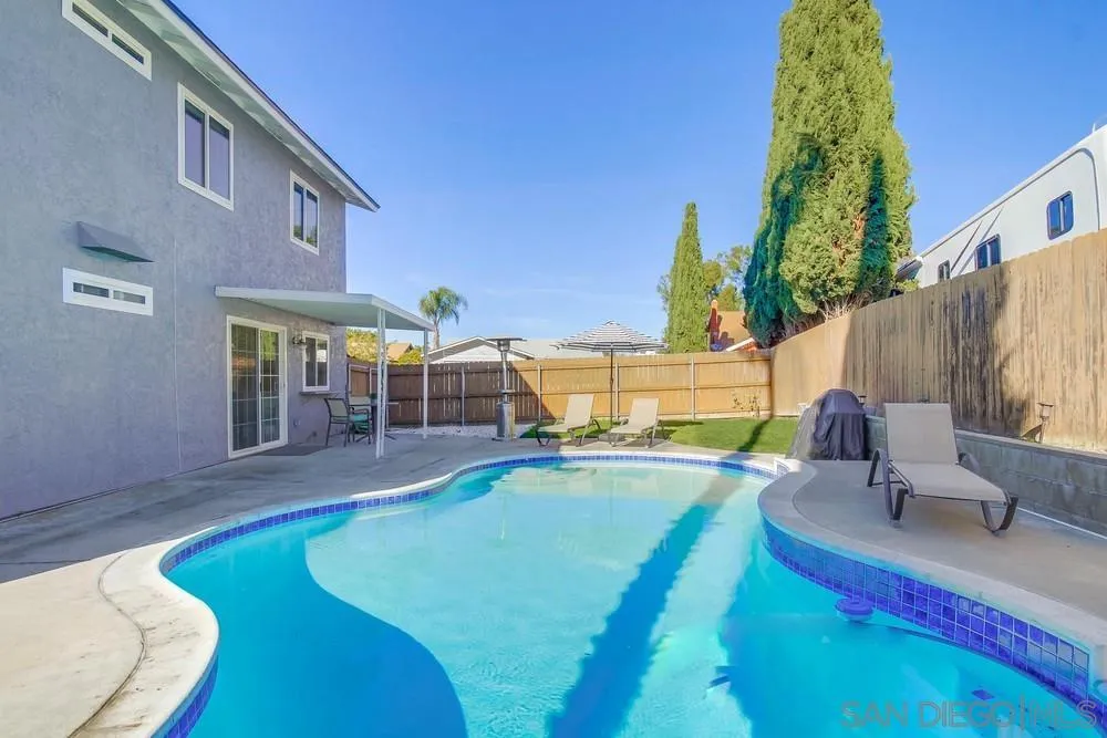 515 Bluffview Road Spring Valley, CA 91977 - Photo 39 of 41 a view of a swimming pool with a lounge chair