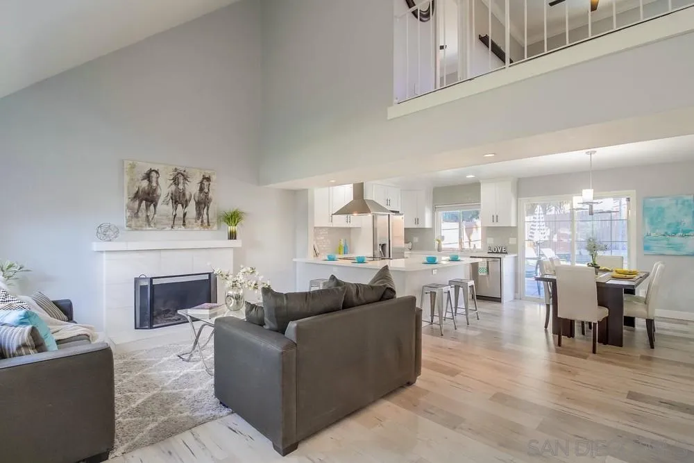 515 Bluffview Road Spring Valley, CA 91977 - Photo 5 of 41 a living room with furniture and a fireplace