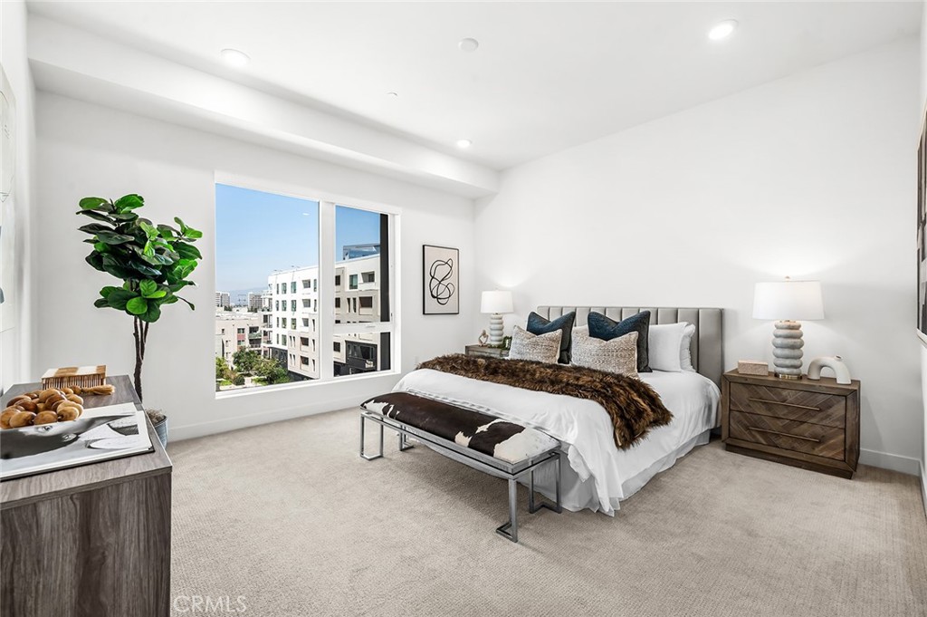 3604 Rivington Irvine, CA 92612 - Photo 25 of 54 a spacious bedroom with a bed and a potted plant