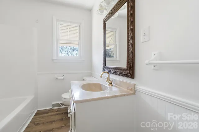 a bathroom with a sink and a bathtub
