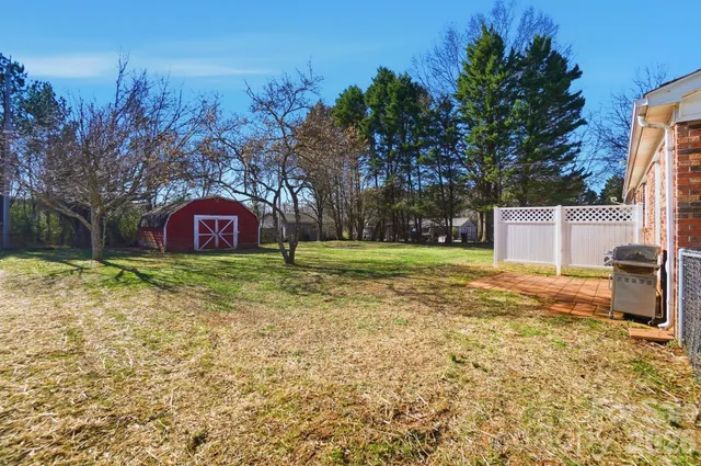 a house with swimming pool in front of it